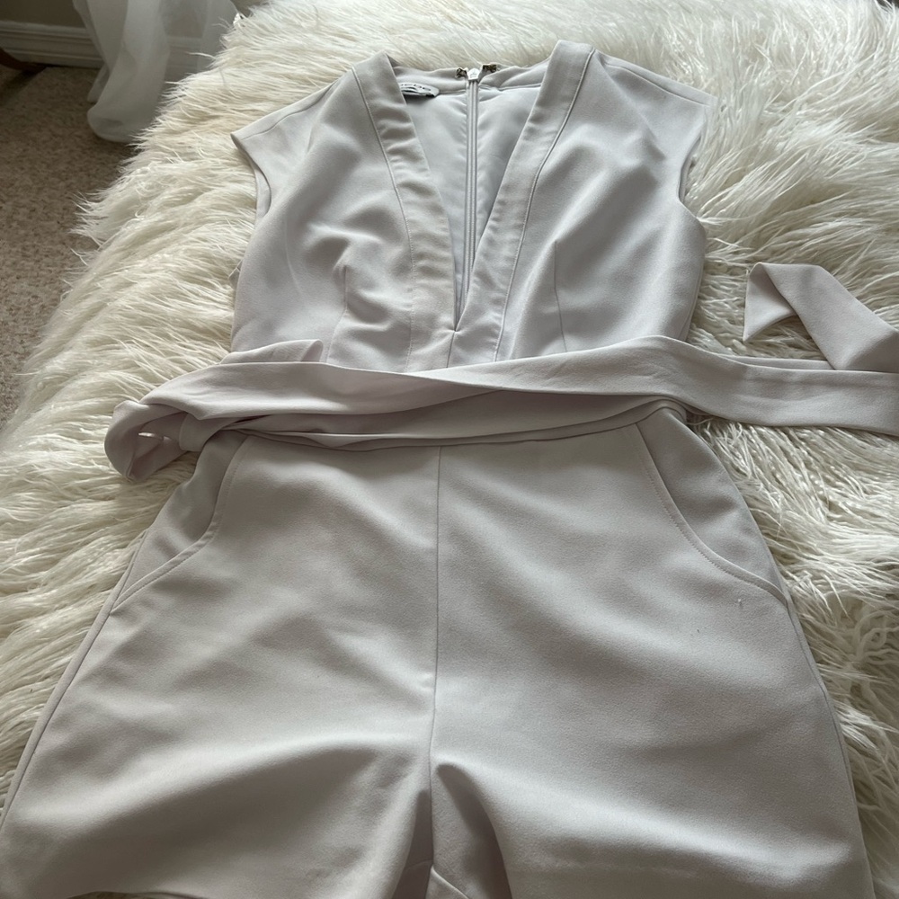 Sleeveless low cut White Romper